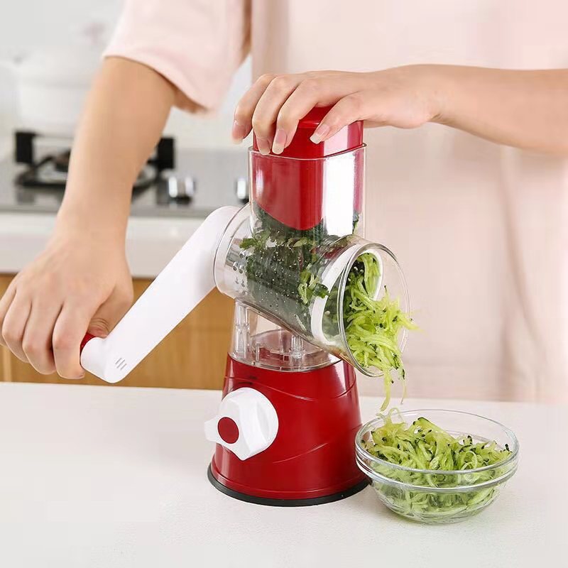 Vegetable chopper with several different attachments to make meal